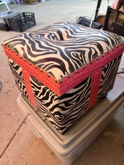 Storage Ottoman zebra print in good condition. Azusa