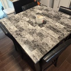 Table And 4 Chairs 