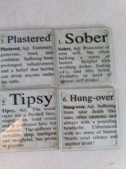 Four glass humorous coaster set