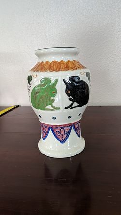 Handmade vase I believe it's bats