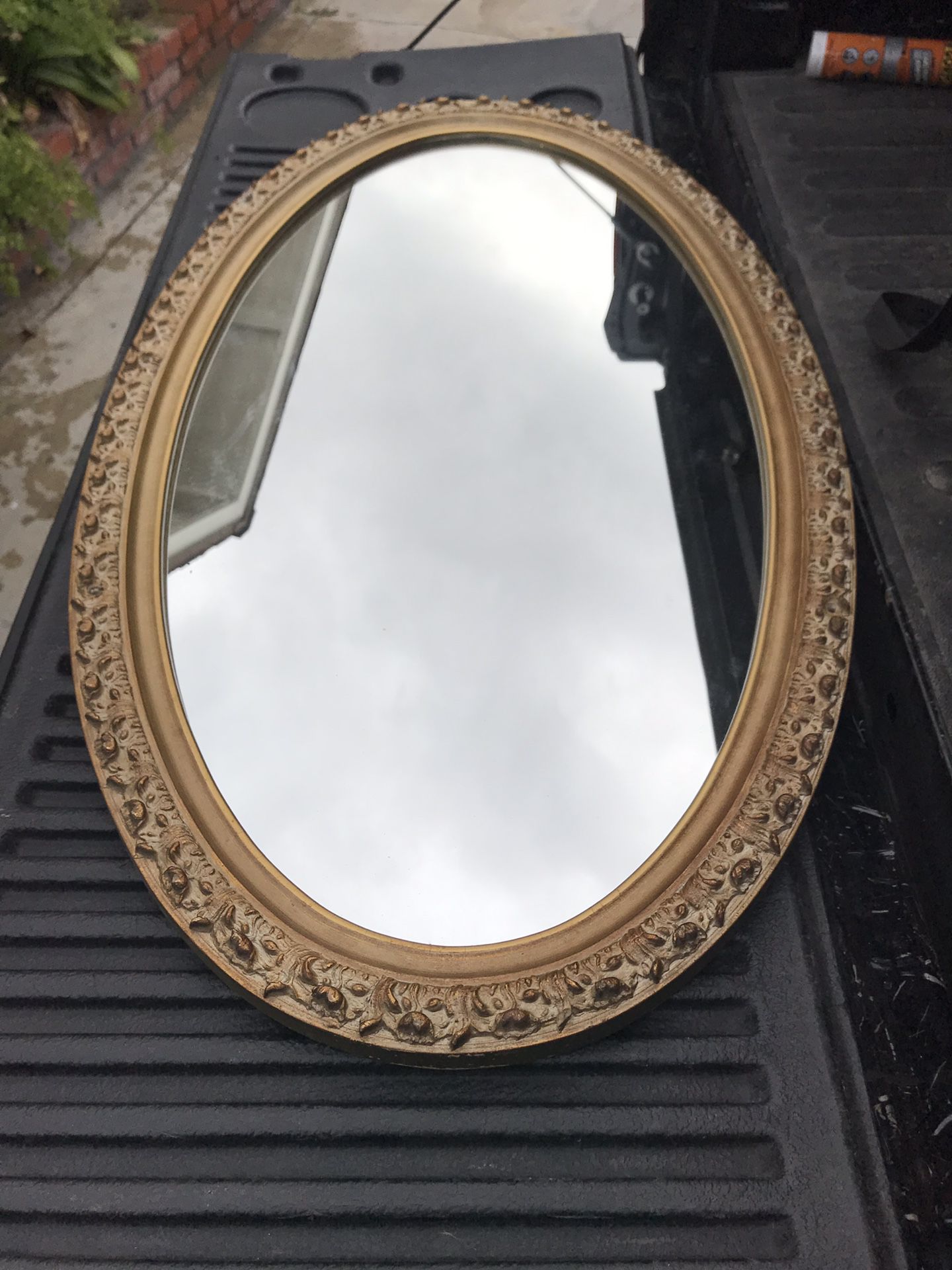 Fancy oval mirror