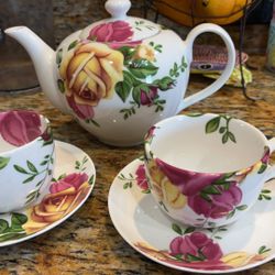 Royal Albert Country Rose tea pot and cups and saucers 