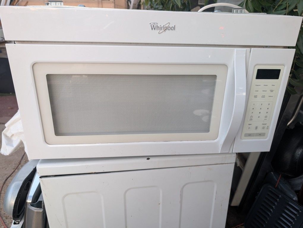 Over The Stove Microwave. Can Deliver