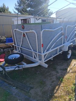 Trash trailer.