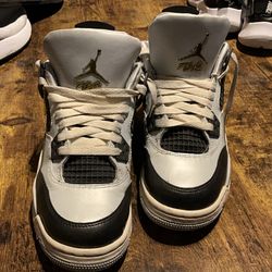Jordan 4 Retro Black and White and Gold