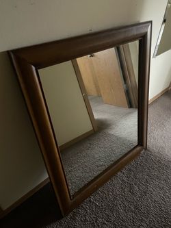 wood-framed mirror