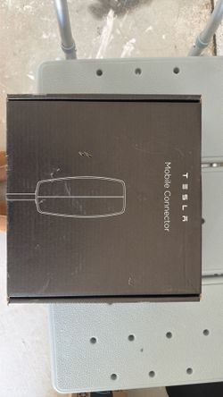 Brand new Tesla charger