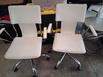 2 white & silver rolling chairs