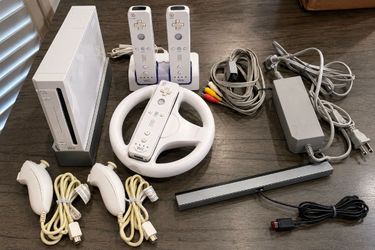 $150 - Pre-Owned Nintendo Wii console everything in picture included - system works, serious buyers don't waste time 
(no games)