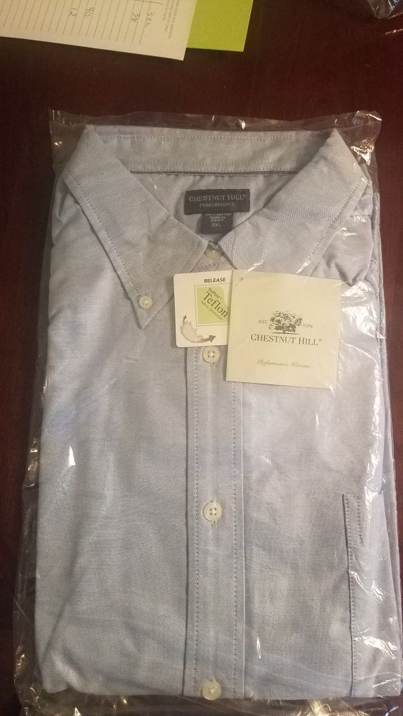 3XL brand new long sleeve light blue button down dress shirt.