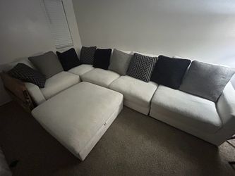 White sectional couch with ottoman (Best Offer)