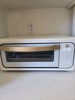 Hermoso Horno Tostador con Freidora de Aire, semi nuevo, en la tienda Walmart esta a 109