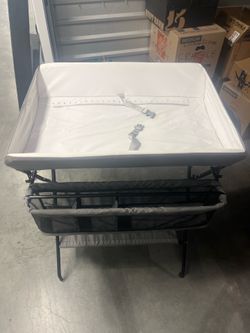Folding changing table