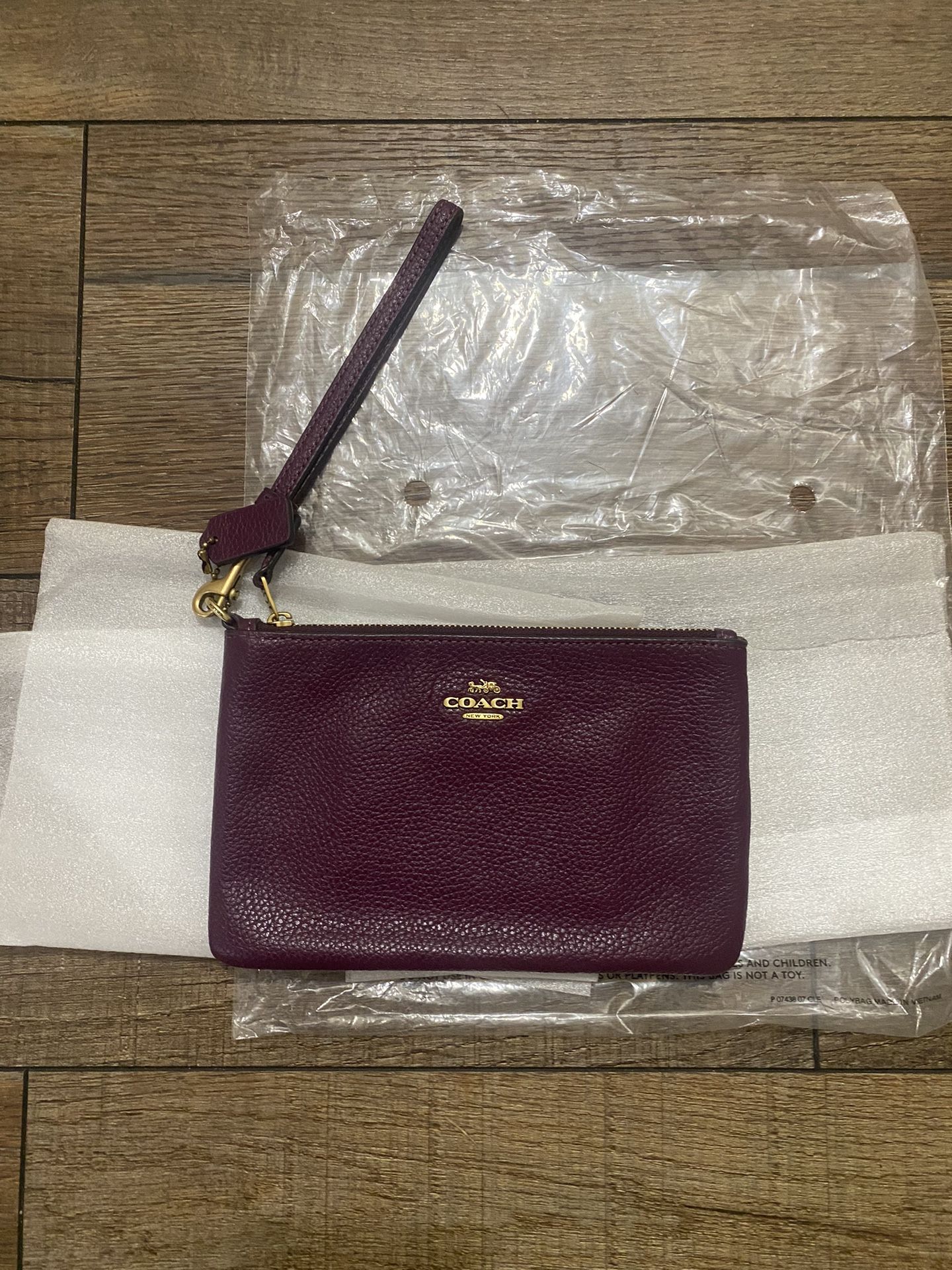 Authentic COACH WRISTLET (gold hardware)