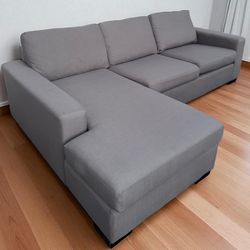 GRAY PULLOUT SECTIONAL COUCH