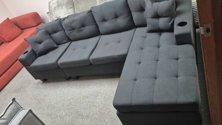 BRAND NEW SECTIONAL COUCH WITH CUP HOLDERS