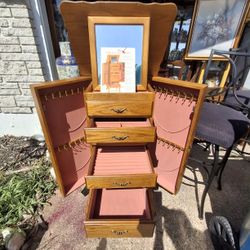 Super Nice LOOKING Vintage  OAK ARMOIRE JEWELRY CASE LITE  COLOR WOOD AND  PINK  ON IN SIDE 
