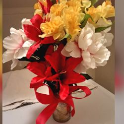 Elaborated at home artificial floral arrangement