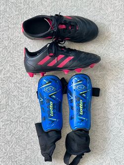 size 2.5 kids Adidas soccer cleats with Lotto shin guards
