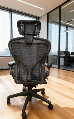 AERON CHAIR HERMAN MILLER.                 SIZE B. POSTUREFIT LUMBAR SUPPORT. PELLICLE WAVE. BLACK LEATHER HEADRESTS