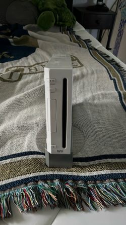 Wii Console with remotes and games
