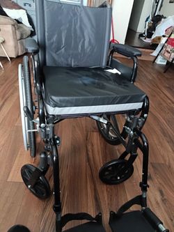 Black Folding Wheelchair with Cushion