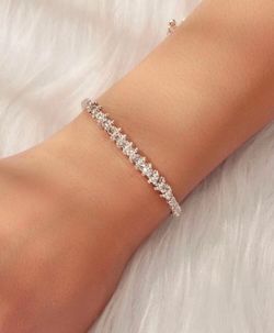 STUNNING New silver rhinestone entwined bracelet