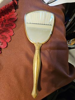 Vintage brass hand mirror