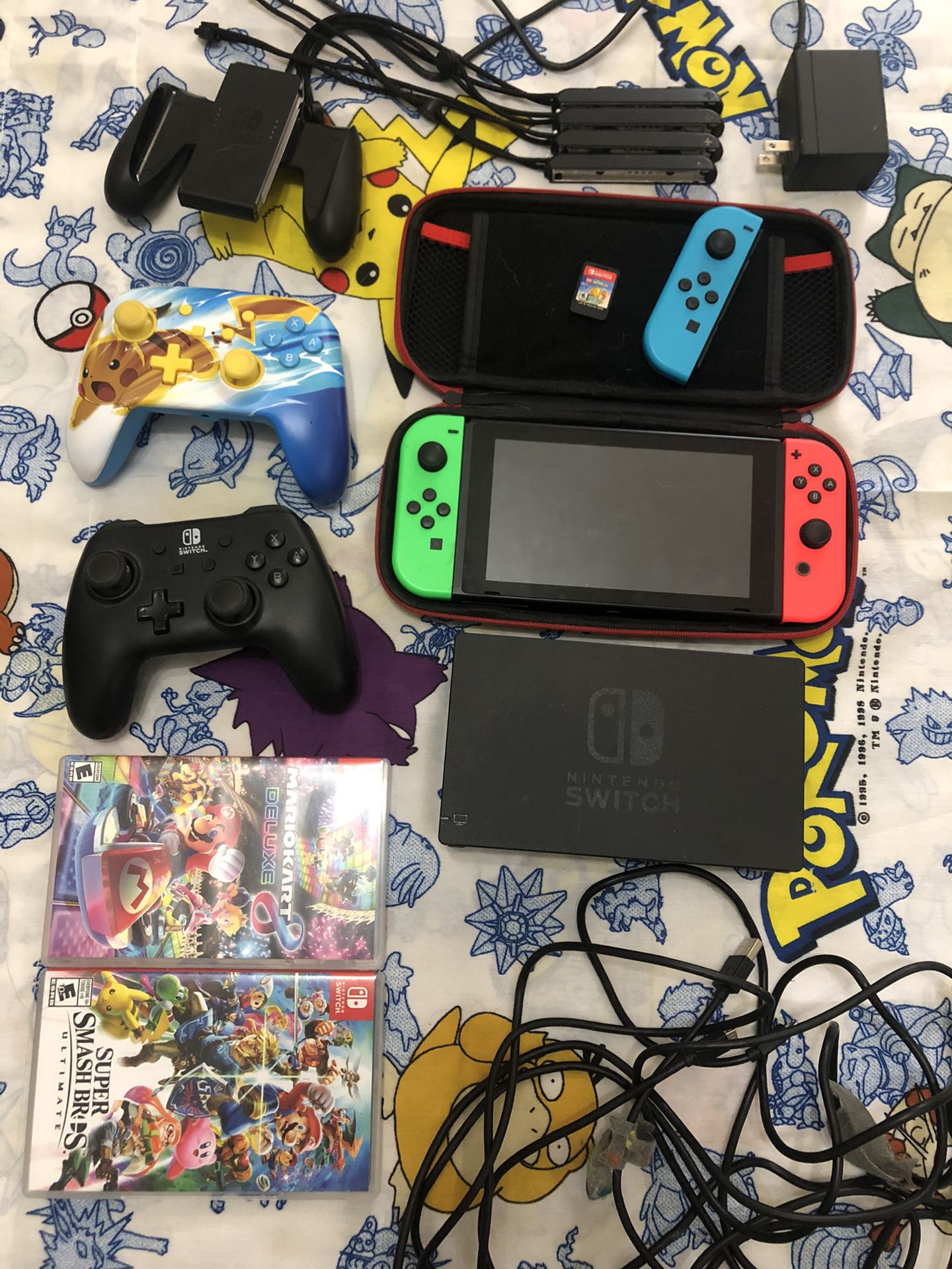 Nintendo Switch with 3 games, 3 joycons, and 2 wired controllers 