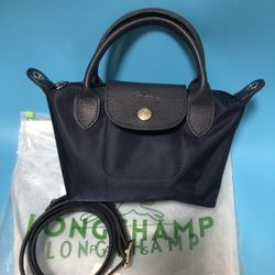 "LongChamp Le Pliage Neo Mini pouch with Shoulder Strap 
"

