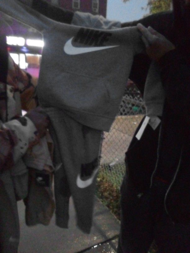 Children's Nike Sweat Suits And Men's Tops