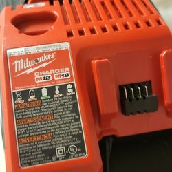 Milwaukee M12/M18 Fast Charger, M18 Battery, And Case