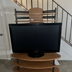 Brown And Black Tv Stand