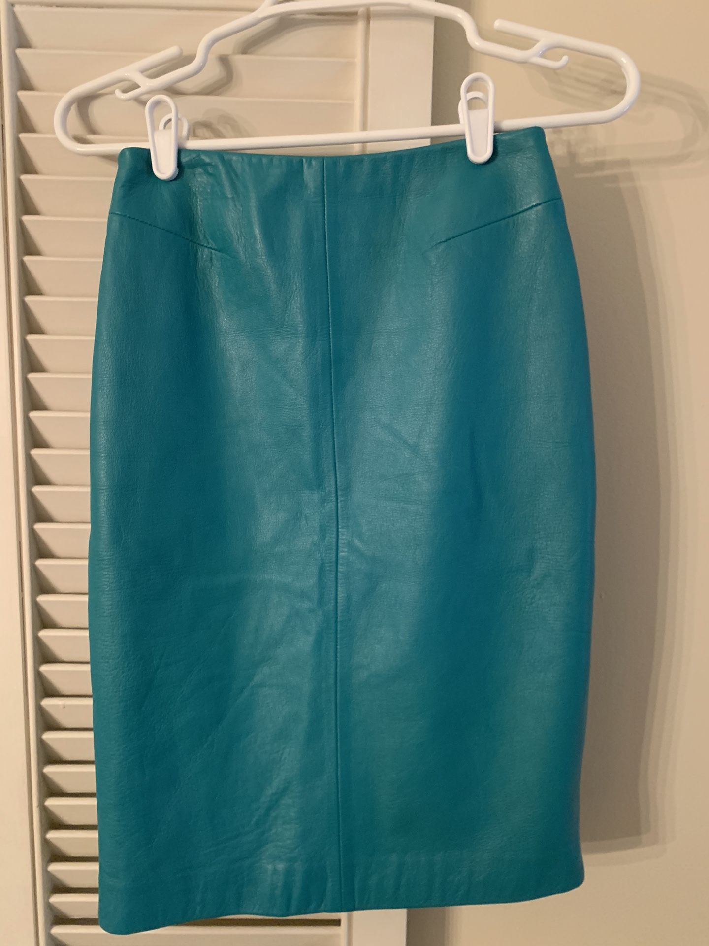 The Real Teal Leather Skirt from Saks