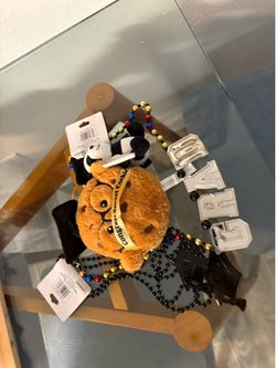 Graduation necklaces and plushies