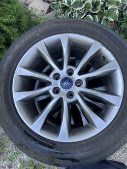 Set Of 4 17” Rims And Tires From A Ford Fusion