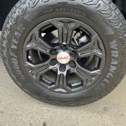 Four 265/65 R18 goodyear wrangler AT tires