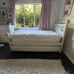  Twin-size bed frame with a lower trundleColor: Off-white / ivory 