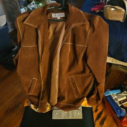 In perfect condition, men's extra large wilson and leather suede jacket