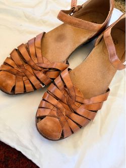 Brown Clark’s bendables leather