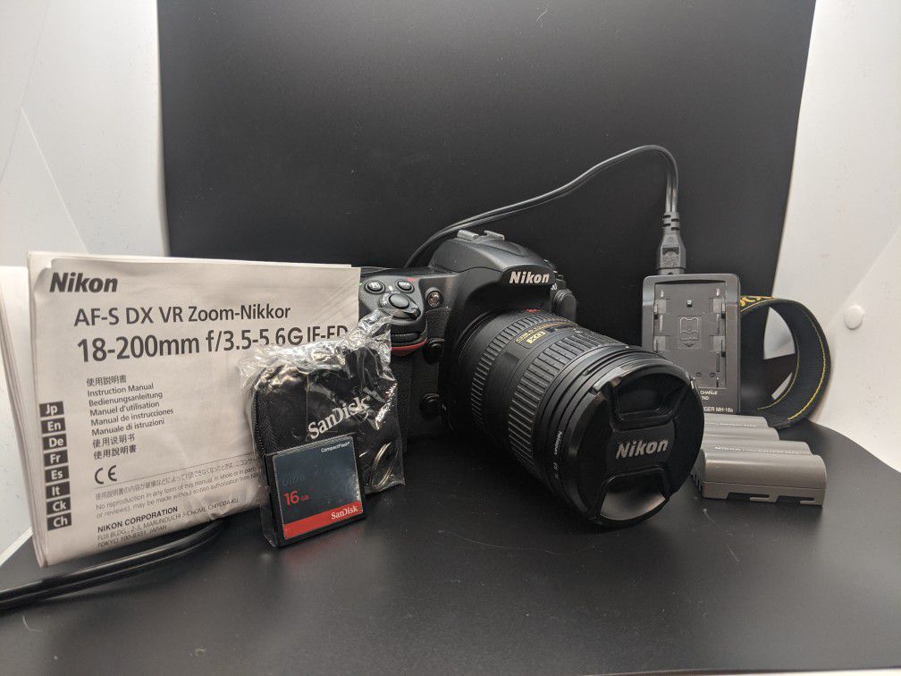 Nikon D300 SLR w 18-200mm lens