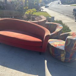 red couch and chairs