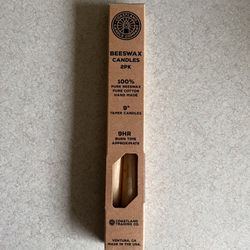 pack of Coastland Candle Company beeswax taper candles.