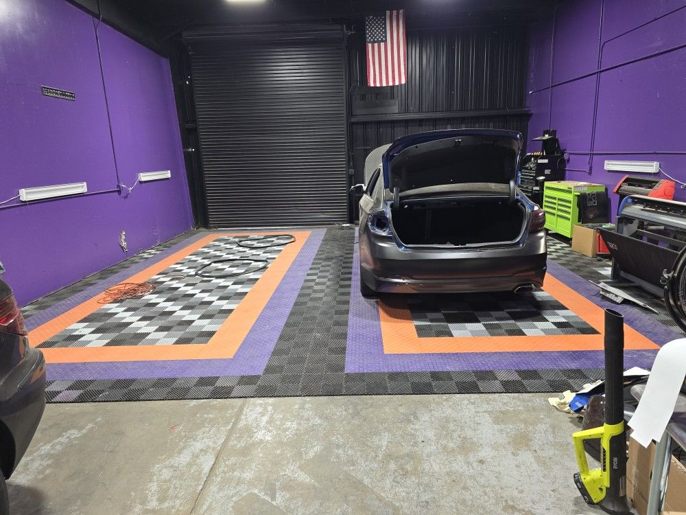 RaceDeck Free-Flow Garage Floor Tiles – 564 Tiles – Purple, Orange, Black, Silver