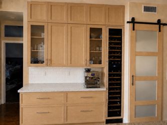 Bright Updated Kitchen with White Cabinetry and Large Island
