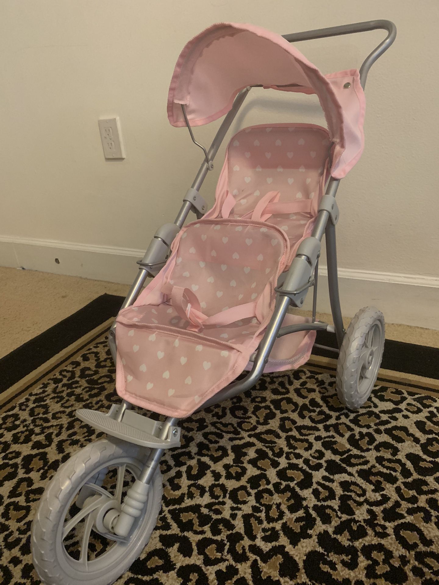 Doll stroller, only the stroller is for sale, not the dolls.