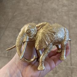Cool chinoiserie style gold luck elephant 