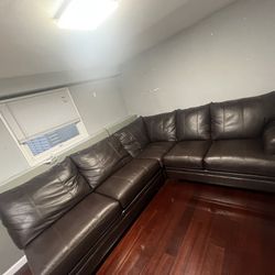 6 Seater Leather sectional with Queen sleeper