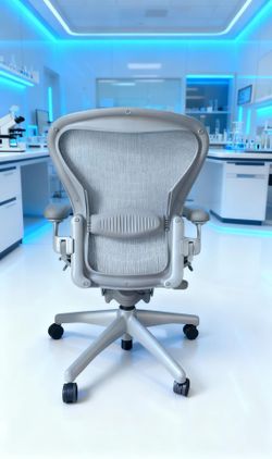 AERON CHAIR HERMAN MILLER.              SIZE B. LUMBAR SUPPORT. TITANIUM PELLICLE WAVE