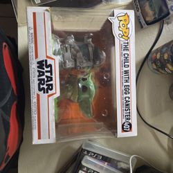 POP! THE CHILD WITH EGG CANISTER # 407 STAR WARS COLLECTIBLE